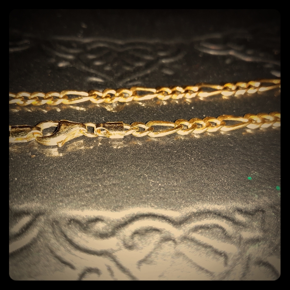 18K Gold 7 inch Figaro Bracelet